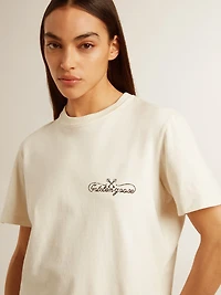 Women’s T-shirt aged white with logo on the chest