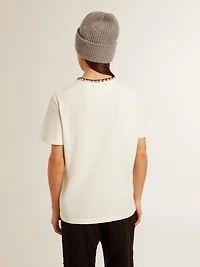 Women's aged white cotton T-shirt with hand embroidery