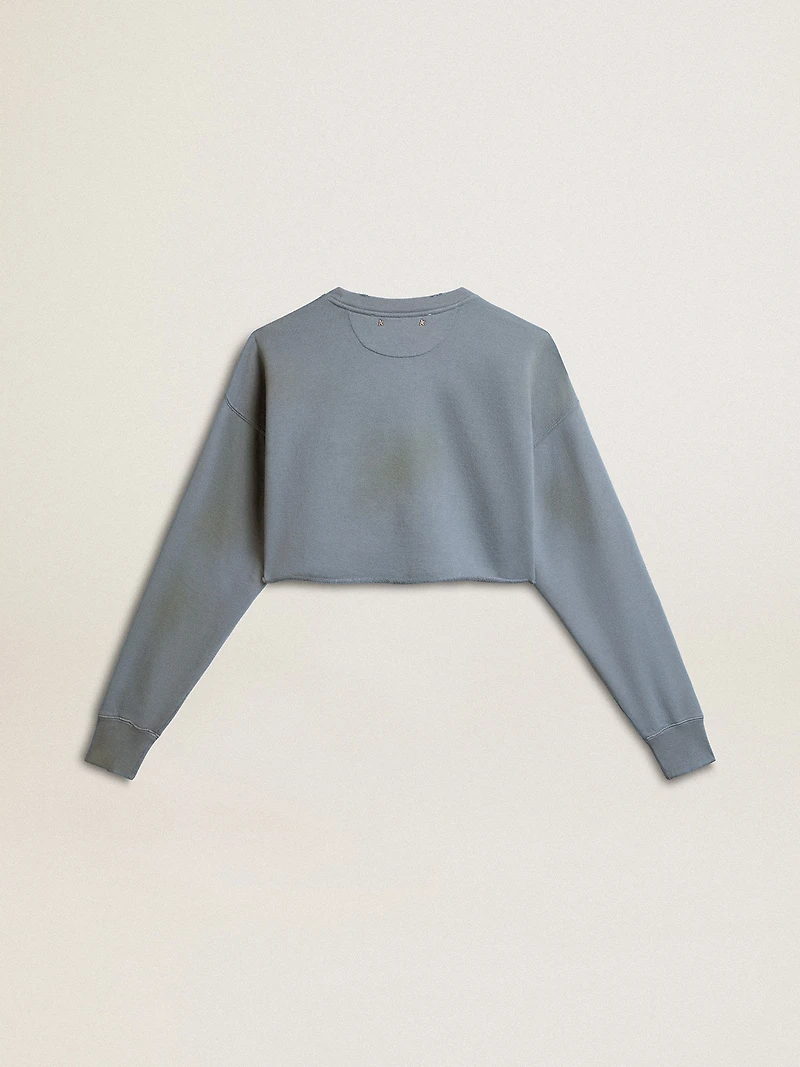 Cropped sweatshirt in baby blue with distressed finish