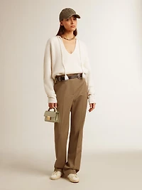 Ribbed wool sweater with V neck and drawstring tassels