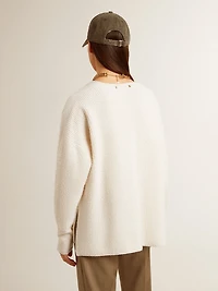 Ribbed wool sweater with V neck and drawstring tassels