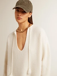 Ribbed wool sweater with V neck and drawstring tassels