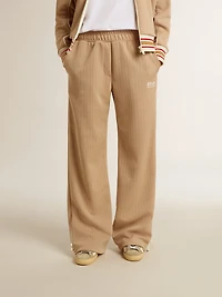 Women’s light beige joggers with white logo
