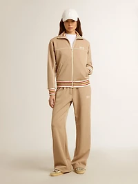 Women’s light beige joggers with white logo