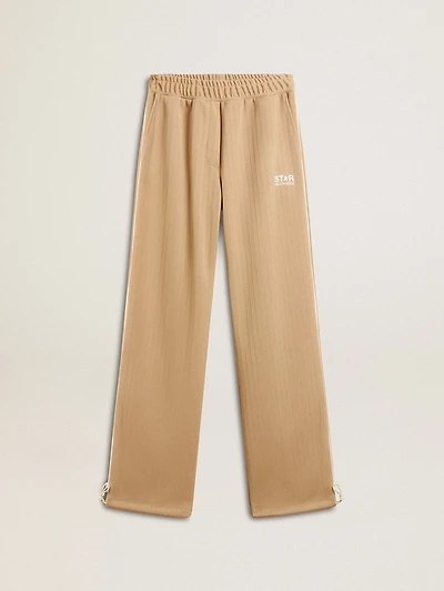 Women’s light beige joggers with white logo