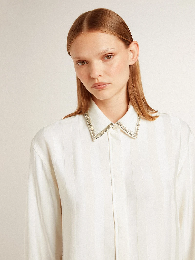 Women's shirt with a vertical striped pattern and crystal embroidery