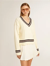 Women's cable-pattern cropped sweater with blue ribbing and crystals