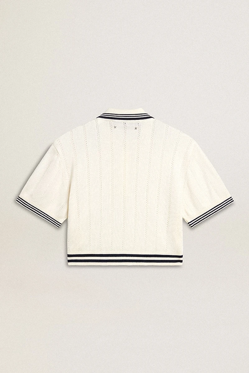 Women's cropped worn-white cotton polo shirt with blue ribbing