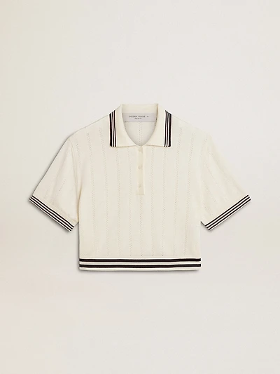 Women's cropped worn-white cotton polo shirt with blue ribbing