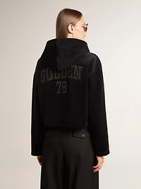 Women’s black chenille sweatshirt with embroidery on the back