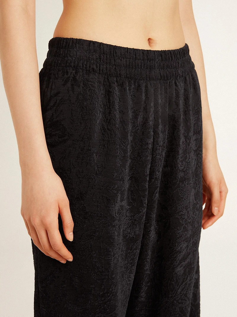 Women's black joggers with a tone-on-tone toile de jouy print