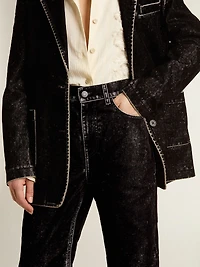 Women's black jeans with a velvet-like wash effect