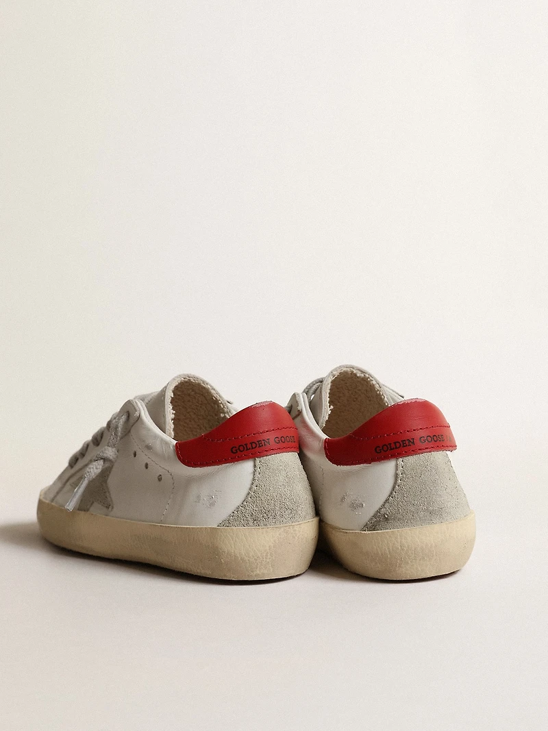 Super-Star Young with suede star and red leather heel tab