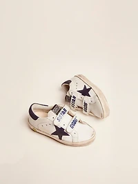 Old School Young white leather with blue suede star and heel tab