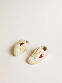 May Young with fuchsia glitter star and metallic leather heel tab
