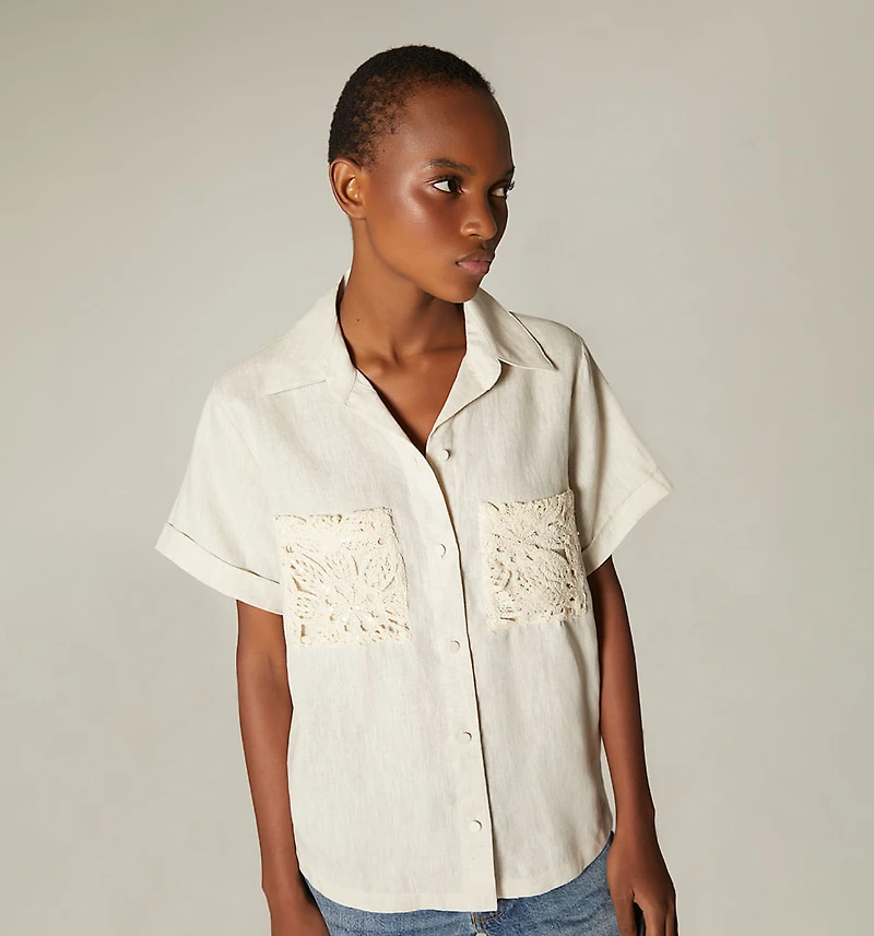 SHORT SLEEVE OPEN BACK BLOUSE