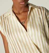 SLEEVELESS BLOUSE WITH CROSSOVER FRONT
