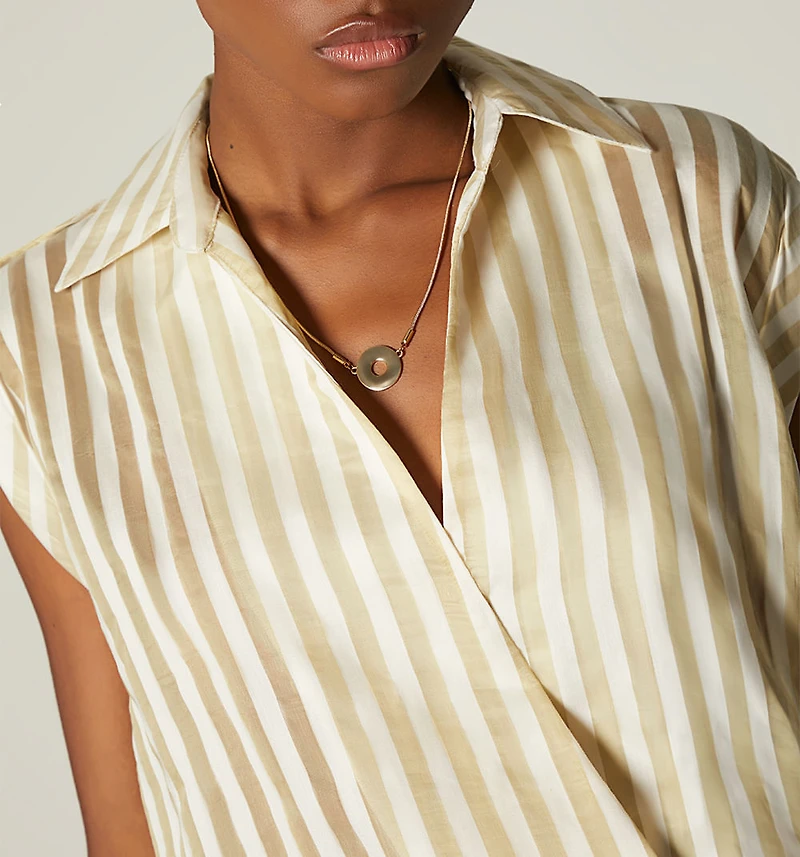 SLEEVELESS BLOUSE WITH CROSSOVER FRONT