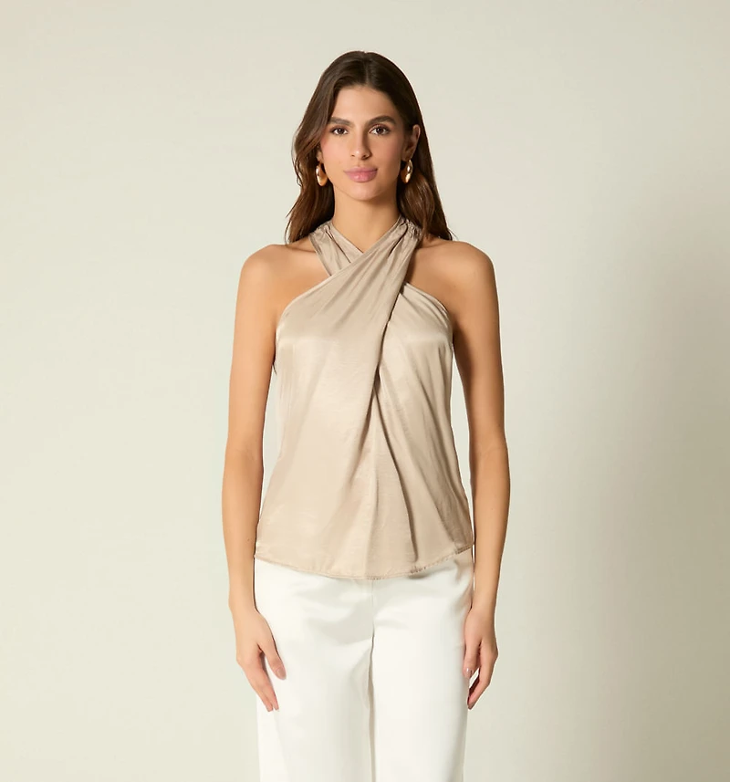 SLEEVELESS CROSSOVER NECKLINE BLOUSE