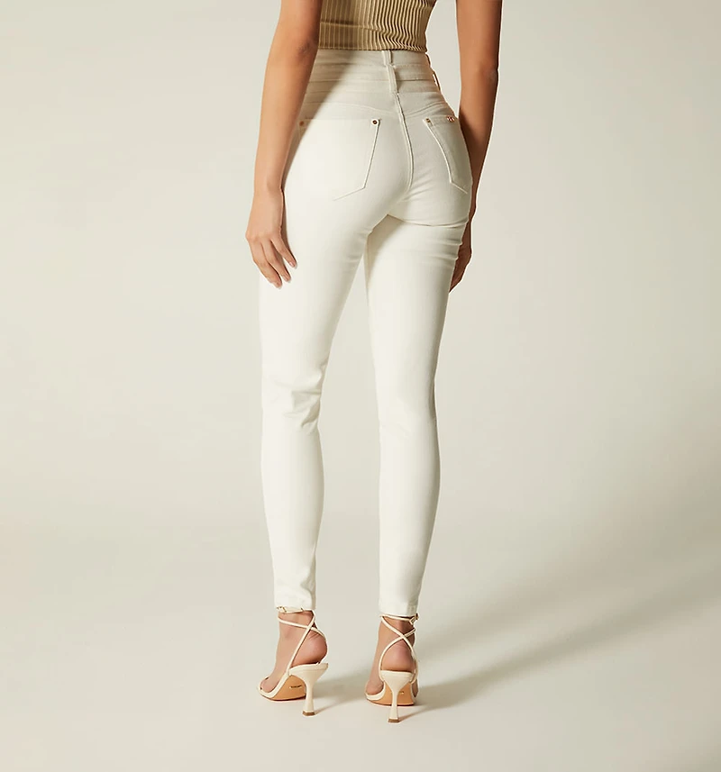 FIVE-POCKET LEATHER EFFECT JEANS