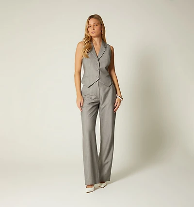 VEST WITH COVERED BUTTONS