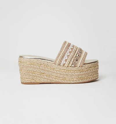 WOVEN PLANAFORMA AND SILVER EMBROIDERY