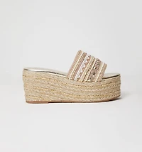 WOVEN PLANAFORMA AND SILVER EMBROIDERY