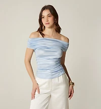 Off-shoulder blouse with continuous sleeves