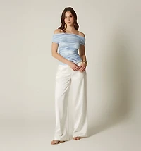 Off-shoulder blouse with continuous sleeves