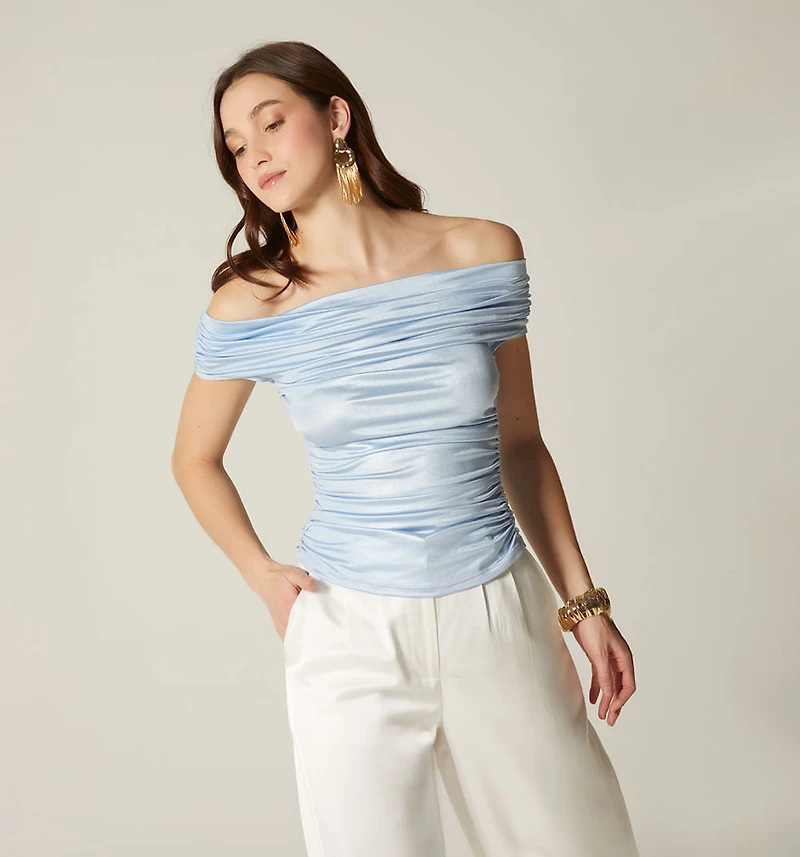 Off-shoulder blouse with continuous sleeves