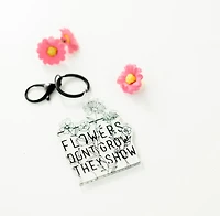 Flowers Don't Grow Keychain