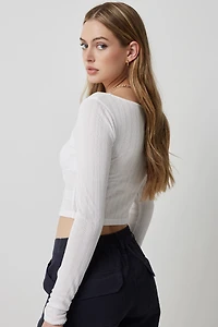 Haut court à manches longues en pointelle