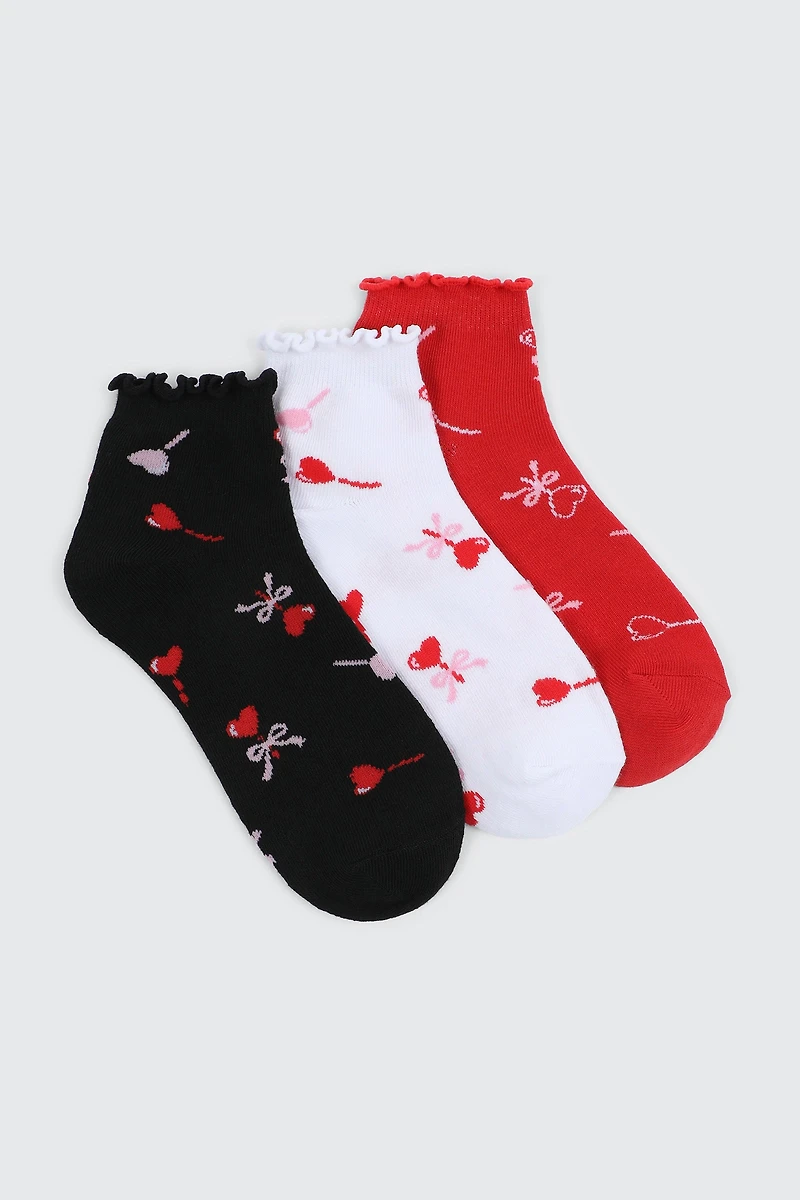 3 paires de chaussettes à cœurs et suçons