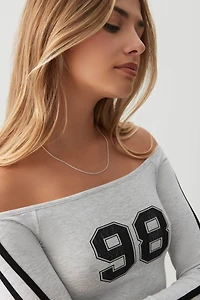 Haut à manches longues et épaules dénudées