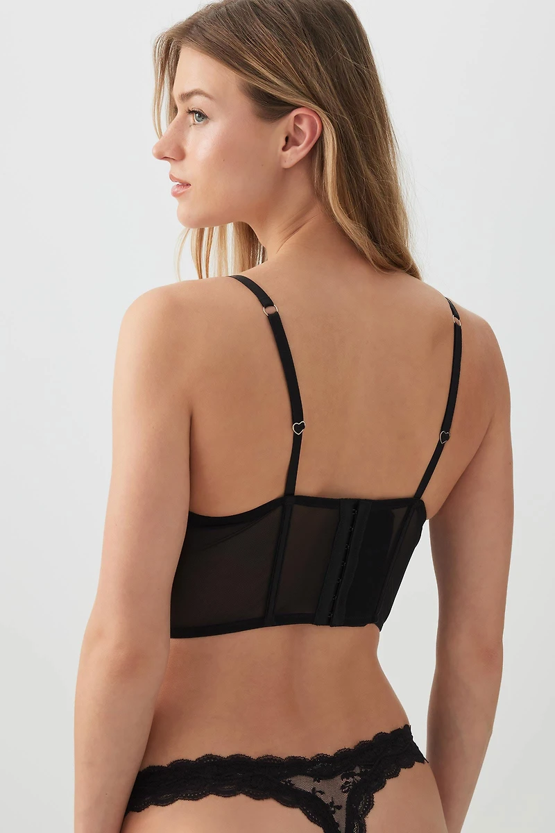 Tanga en dentelle festonnée tout-aller