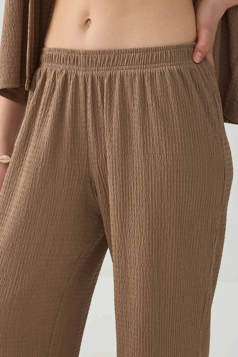 Pantalon à jambe large en tissu texturée