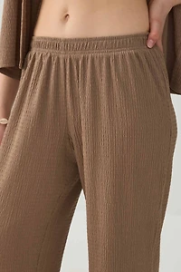 Pantalon à jambe large en tissu texturée