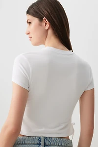 T-shirt court à boucles latérales