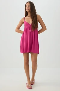 Robe courte style nuisette nouée à l'avant