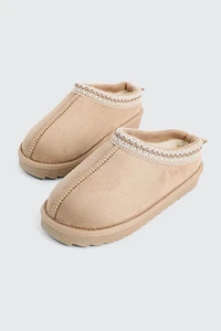 Sabots en faux mouton à bordure accent