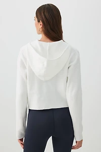 Chandail court à capuchon et glissière en tricot