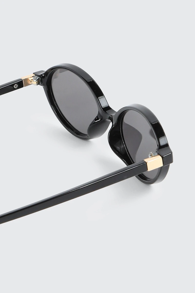 Lunettes de soleil ovales à monture pleine