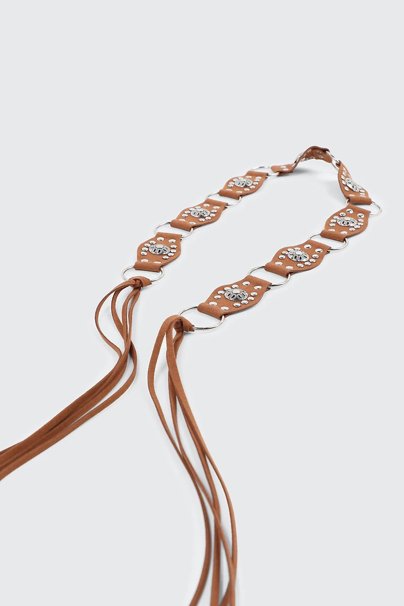 Ceinture taille cloutée en fausse suédine