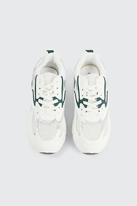 Espadrilles deux tons à détails argentés