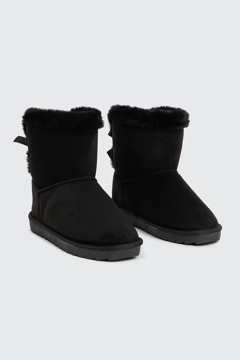 Bottes plateformes en faux mouton à boucle