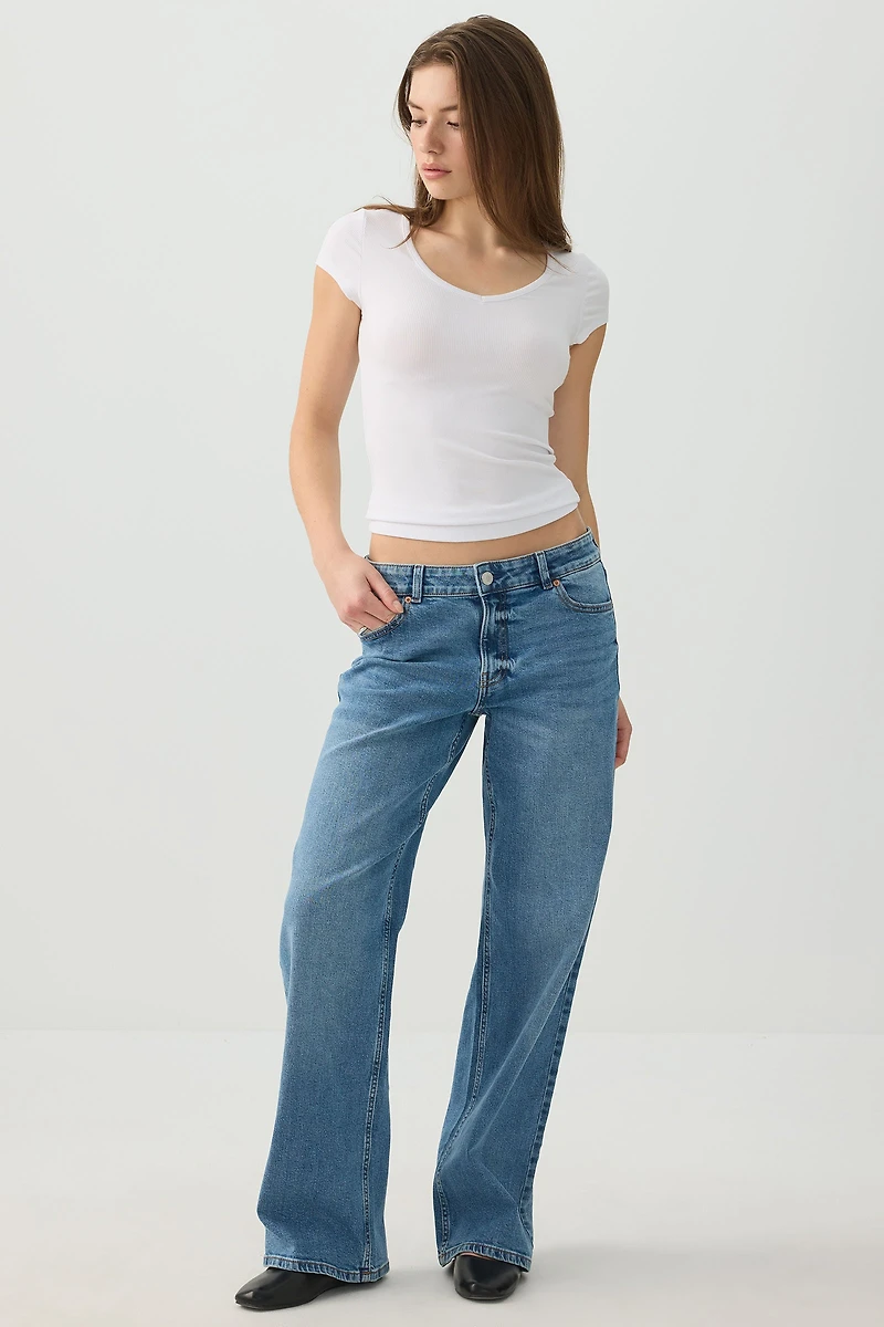 Haut à mancherons et col dégagé extensible