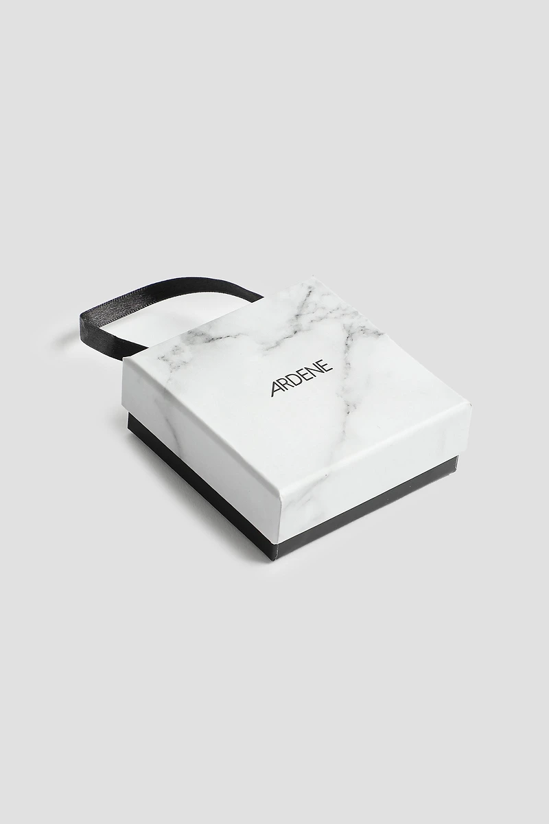 Ensemble boucles d'oreilles et collier étoile