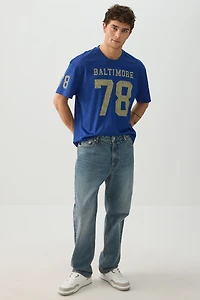 Jean à jambe droite extensible