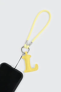 Breloque en faux cuir initiale L jaune et sangle