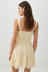 Robe courte smockée à volants